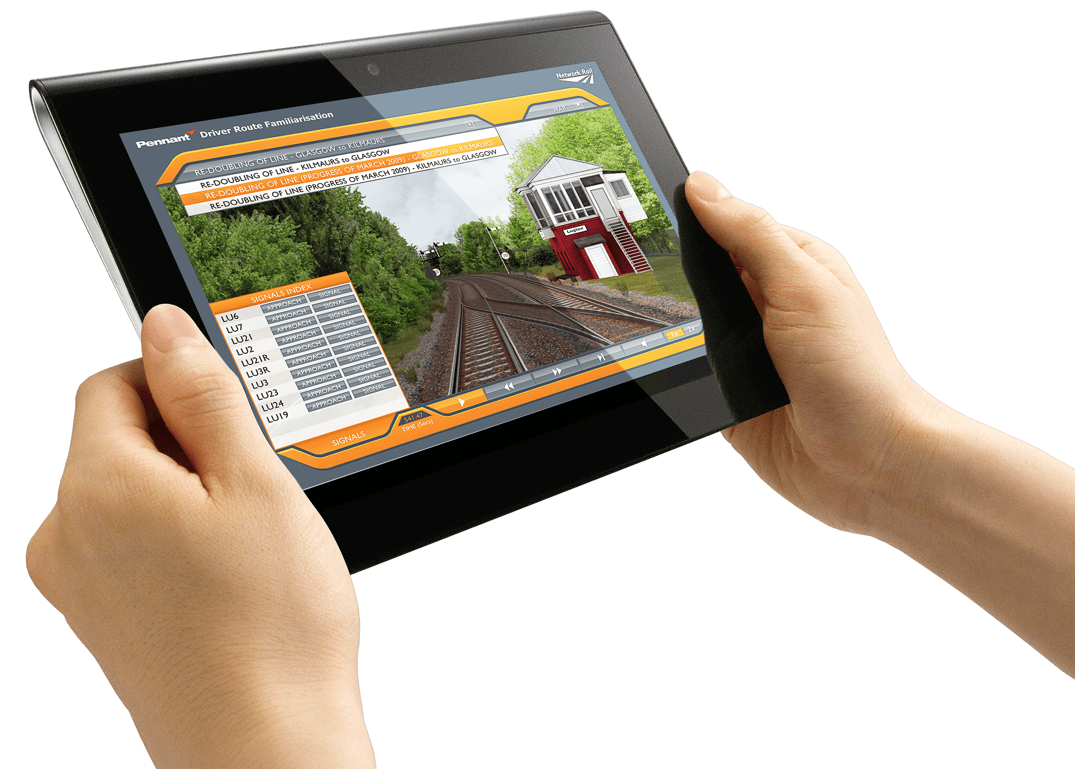 two hands holding a tablet with a railway track scene on the screen